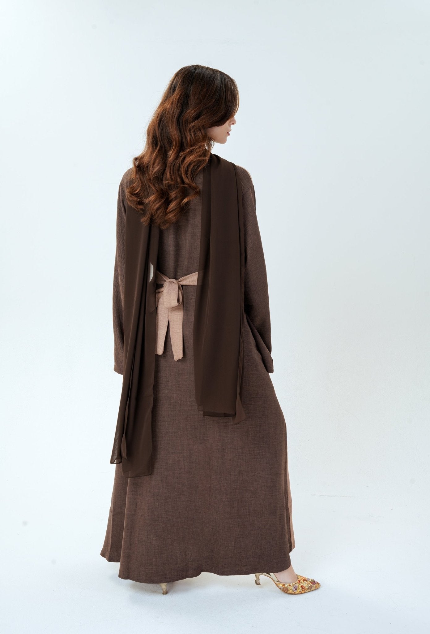Women wearing chestnut charm abaya dress with belt and pockets. Modest fashion UK by MODMOD