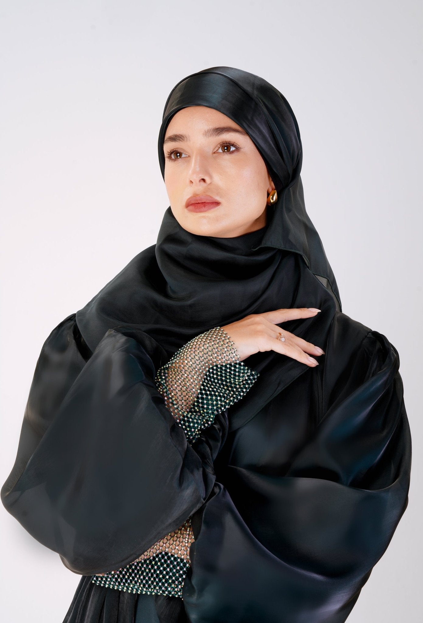 Jewel Gleam Abaya- a beautiful statement abaya in jewel green color, perfect for intimate outings- Modest fashion by MODMOD UK